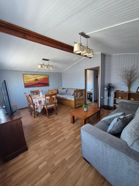 TV and multimedia, Living room, Photo of the whole room, Seating area, Dining area