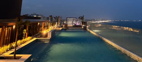 Night, Pool view, Sea view, Swimming pool