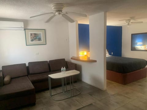 Bed, Living room, Food and drinks, Seating area, Food, Meals, heating, air conditioner