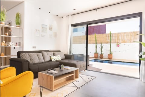 Living room, Seating area, Pool view, Swimming pool, sunbed