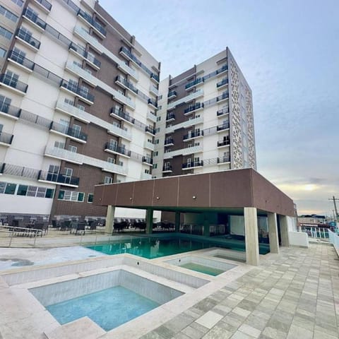 Property building, Day, Pool view, Swimming pool, sunbed