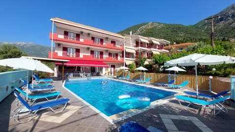 Property building, Pool view, Swimming pool, sunbed