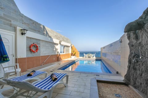 Property building, Living room, Swimming pool