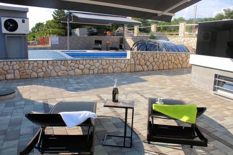 Patio, Day, Natural landscape, Pool view, Swimming pool, sunbed