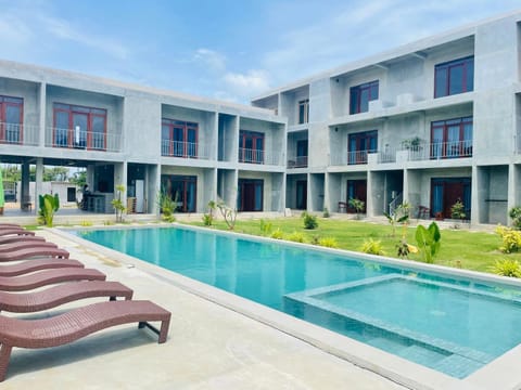 Property building, Pool view, Swimming pool, sunbed