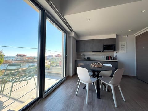 View (from property/room), Balcony/Terrace, Kitchen or kitchenette, Dining area
