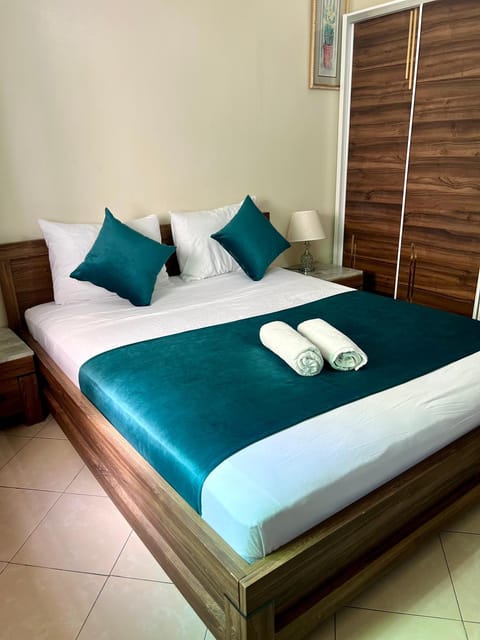 Bed, Photo of the whole room, Bedroom, towels, wardrobe