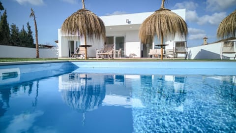 Property building, Living room, Swimming pool
