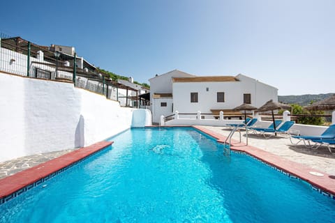 Property building, Living room, Swimming pool