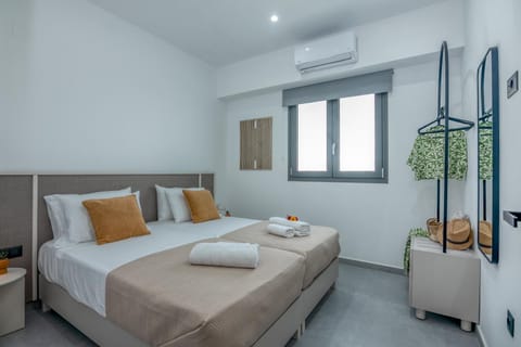 Bed, Photo of the whole room, Bedroom, towels, air conditioner