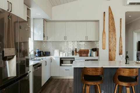 Kitchen or kitchenette, dishwasher, oven, stove, toaster