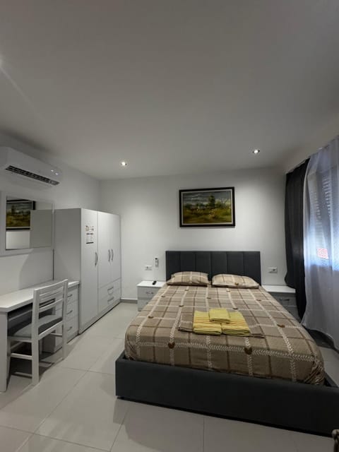 Bed, wardrobe, air conditioner