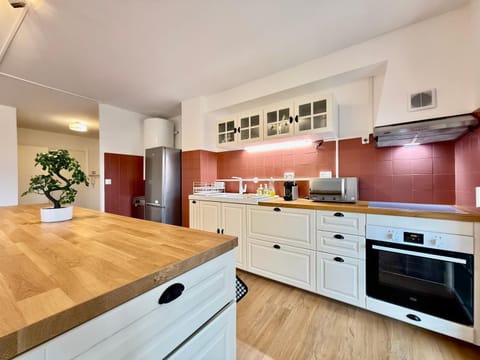 Kitchen or kitchenette, dishwasher, oven, stove, toaster