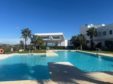 Property building, Pool view, Swimming pool, sunbed