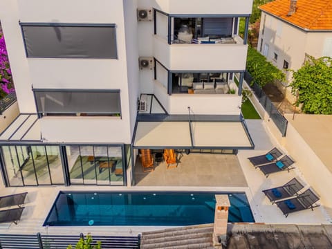 Property building, Patio, Day, View (from property/room), Balcony/Terrace, Pool view, Swimming pool, sunbed