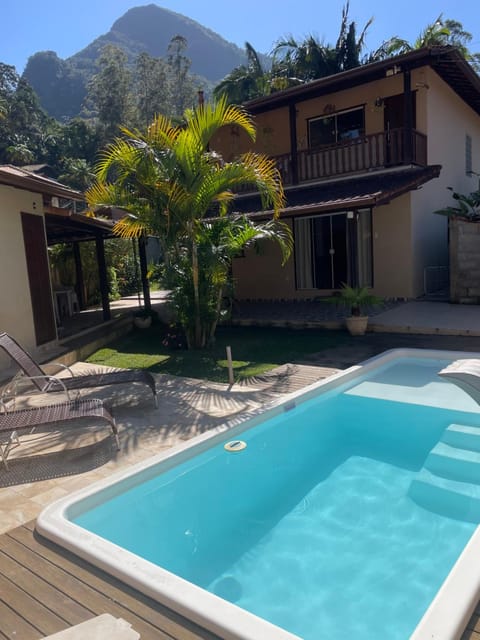 Property building, Day, Natural landscape, Mountain view, Pool view, Swimming pool, sunbed