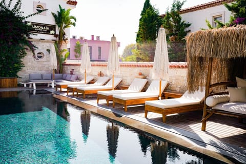 Patio, Seating area, Pool view, Swimming pool, sunbed