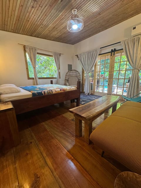 Bed, Living room, Seating area