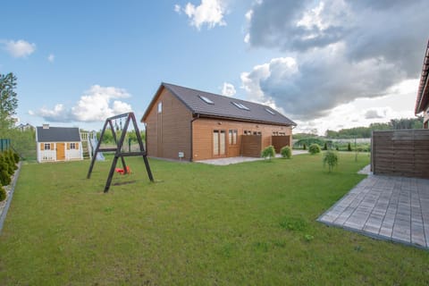 Domki w stylu góralskim Myśliwska 20 Campground/
RV Resort in West Pomeranian Voivodeship, Poland