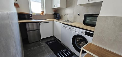 Kitchen or kitchenette, stove