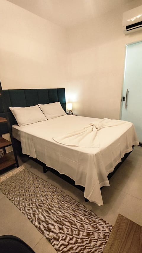 Bed, Photo of the whole room, Bedroom, towels, air conditioner