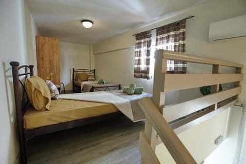 Bed, Photo of the whole room, Bedroom, towels, air conditioner