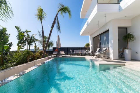 Property building, Patio, View (from property/room), Swimming pool, sunbed