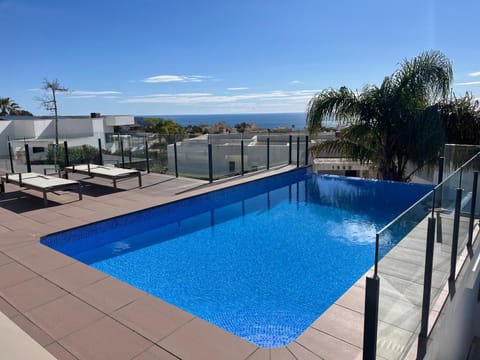 Pool view, Sea view, Swimming pool, sunbed