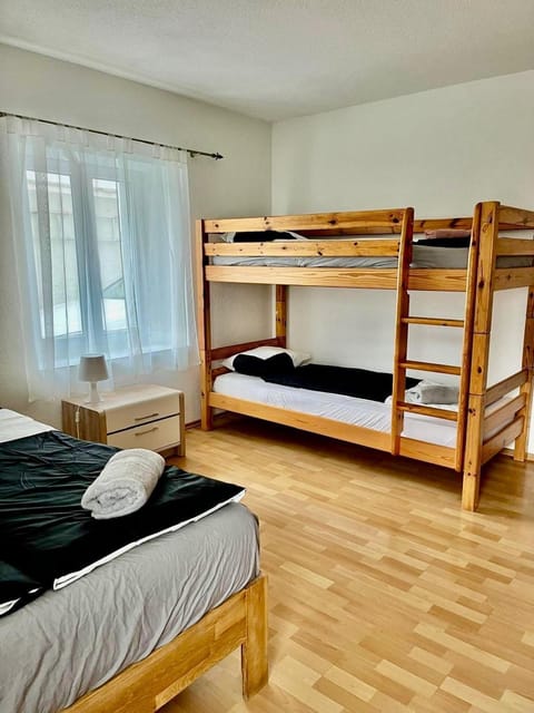 Bed, Photo of the whole room, Bedroom, bunk bed, towels