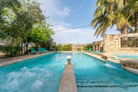 Property building, Living room, Swimming pool