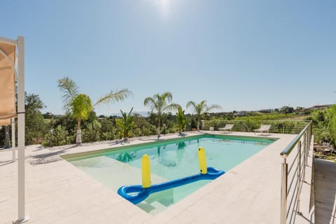 Property building, Living room, Swimming pool