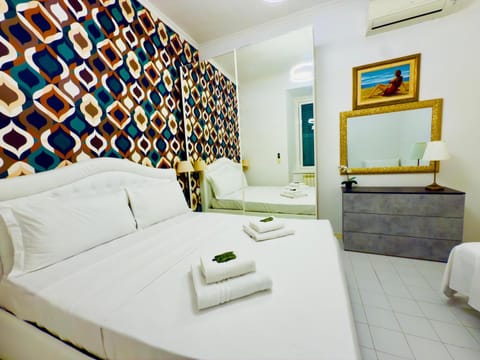 Bed, Photo of the whole room, Bedroom, towels, air conditioner