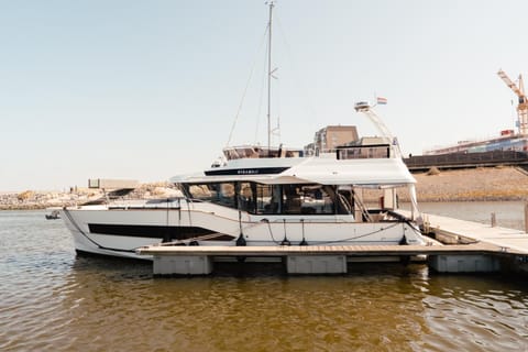 Yacht by Strandhotel - hotel service & wellness Docked boat in Zeeland, Netherlands