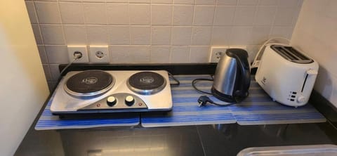 The Palmana Tropical Roofline Jayakarta Residence 40 Apartment in Kuta