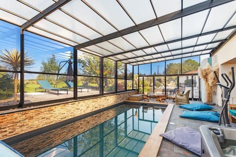Patio, Day, Natural landscape, Pool view, Swimming pool, sunbed