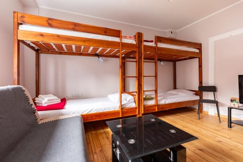 Bed, Living room, Photo of the whole room, Seating area, Bedroom, bunk bed, towels, wardrobe