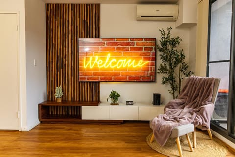 TV and multimedia, Living room, Seating area, Text overlay