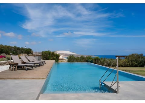 Property building, Living room, Swimming pool
