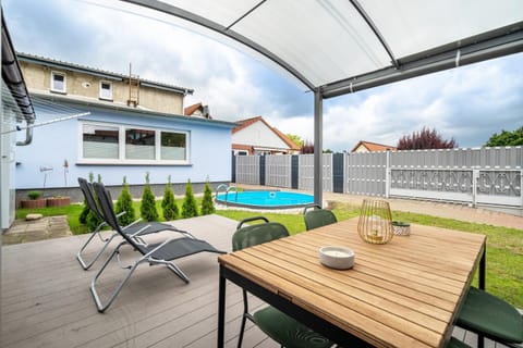 Property building, Living room, Swimming pool