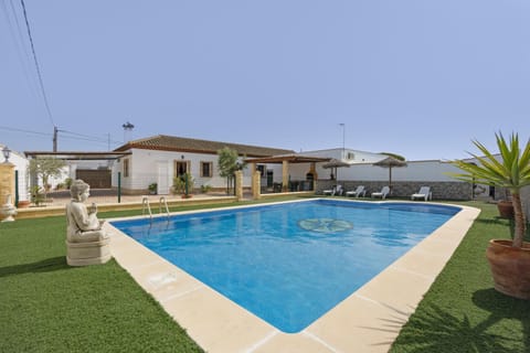 Property building, Living room, Swimming pool