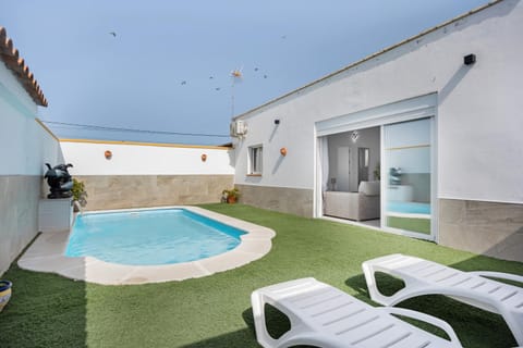 Property building, Living room, Swimming pool
