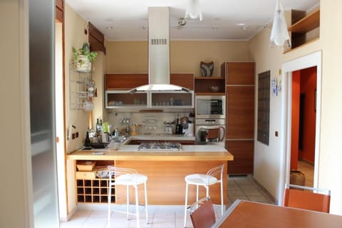 Kitchen or kitchenette, dishwasher, oven, stove, toaster