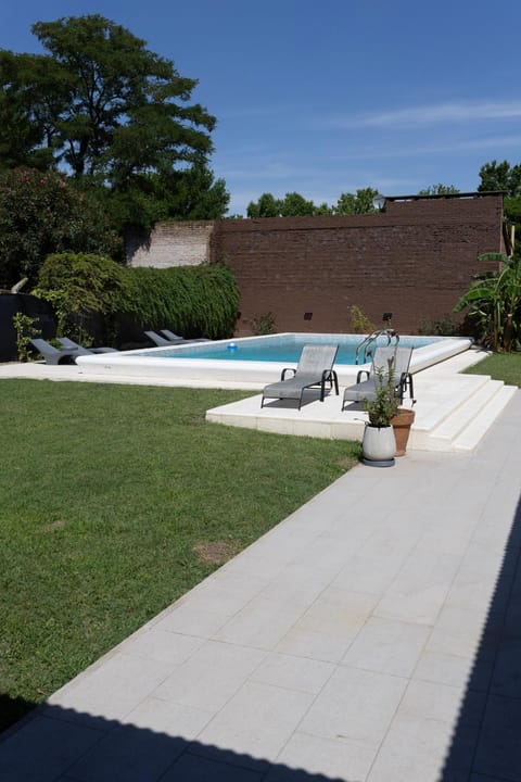Swimming pool, sunbed