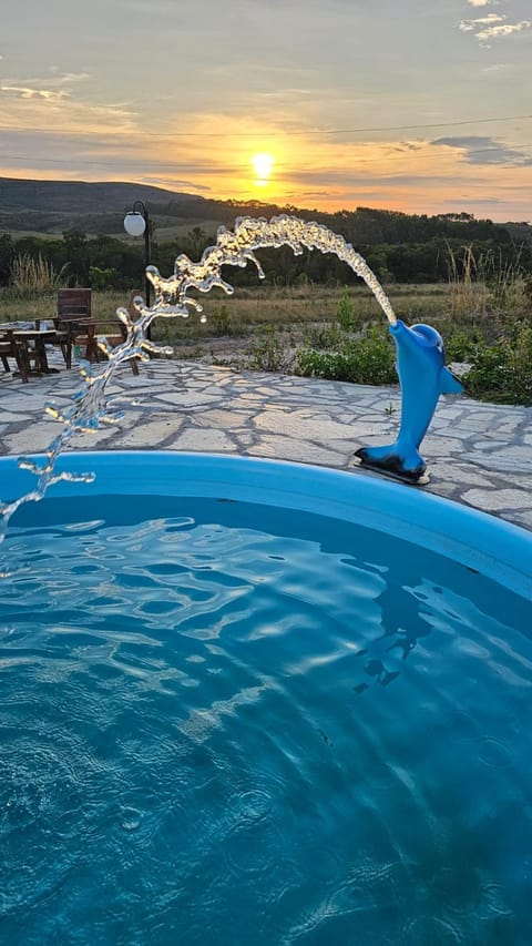 View (from property/room), Swimming pool, Sunset