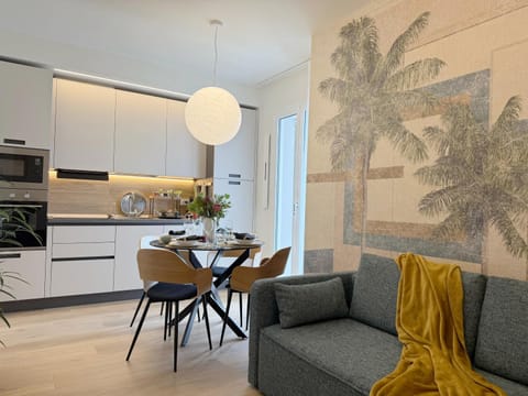 Kitchen or kitchenette, Living room, Seating area, Dining area, stove