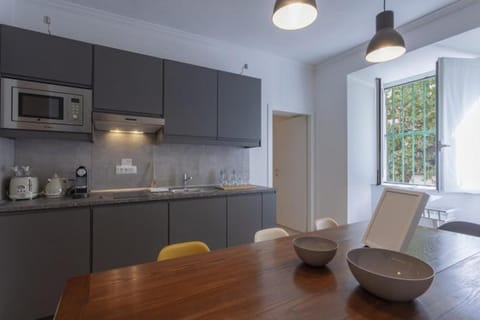 Dining area, dishwasher, microwave, stove, toaster, kitchen