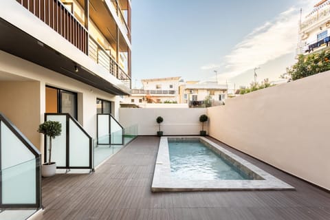 Property building, Patio, Pool view, Swimming pool, Inner courtyard view