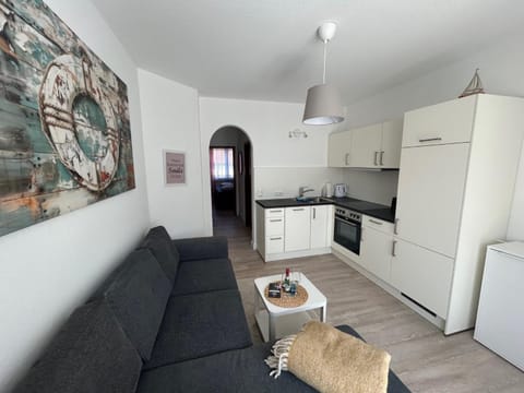 Kitchen or kitchenette, Living room, Seating area, oven, stove