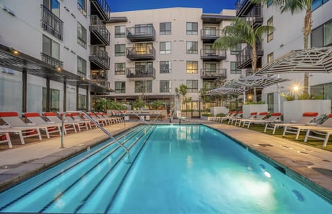 Property building, Swimming pool, Swimming pool, sunbed