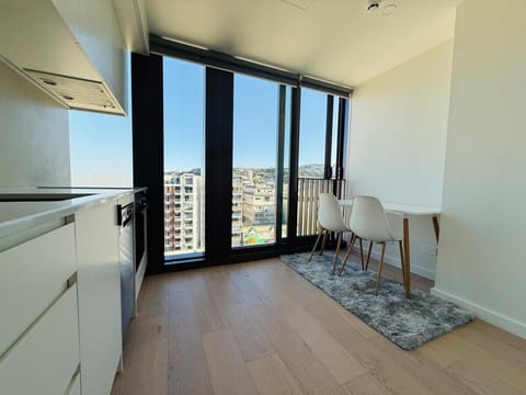 Kitchen or kitchenette, Living room, Seating area, Dining area